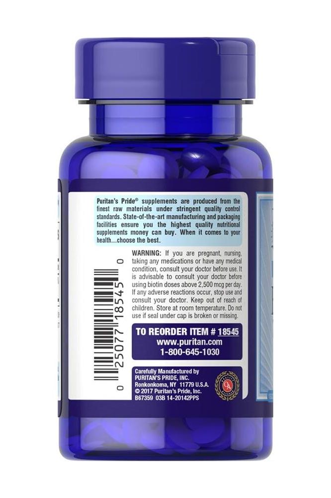 Puritan's Pride Biotin 7500 mcg supplement bottle, featuring product label and health warnings. Puritan's Pride Biotin 7500 mcg supplement bottle, featuring product label and health warnings.