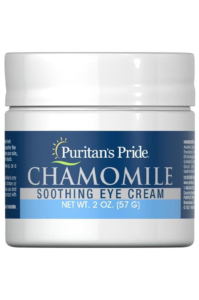Puritan's Pride Chamomile Soothing Eye Cream 57g in a white jar, designed to reduce puffiness and nourish the skin around the eyes.