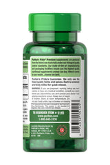 Puritan's Pride Ginger Root 550 mg supplement bottle, 100 capsules, promoting digestion and travel comfort.