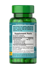 Puritan's Pride Green Tea Extract 315 mg capsules in a green bottle with labels and supplement facts.
