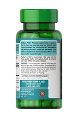 Puritan's Pride Green Tea Extract supplement bottle with green capsules, antioxidant support, and quality guarantee information.