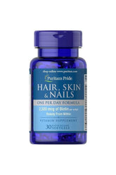 Puritan's Pride Hair, Skin & Nails supplement bottle with 2500 mcg biotin for beauty from within.