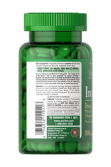 Puritan's Pride Iron All Iron supplement bottle with 100 green tablets, featuring B vitamins and no artificial additives.