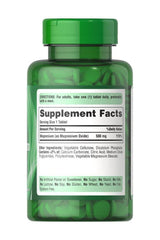Puritan's Pride Magnesium 500 mg supplement bottle, 100 tablets with nutrition facts on label.