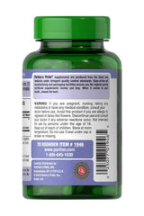 Puritan's Pride Milk Thistle 1000 mg supplement bottle with detailed precautionary label.