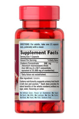 Puritan's Pride Cranberry capsules bottle showing supplement facts and dosage for urinary health.