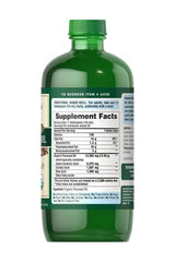 Puritan's Pride Organic Flaxseed Oil 473 ml bottle with supplement facts label.