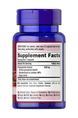 Puritan's Pride Pomegranate Extract 250 mg supplement bottle with supplement facts label.