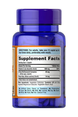Puritan's Pride Vitamin C-500 mg with Bioflavonoids and Rose Hips trial size bottle and supplement facts label.