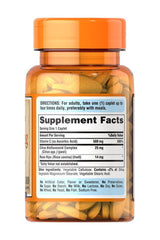 Puritan's Pride Vitamin C 500 mg caplets supplement bottle with nutritional facts, orange cap, and caplet view.