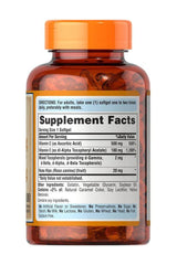 Puritan's Pride Vitamin C & E 500 mg/400 IU softgel bottle with supplement facts label.