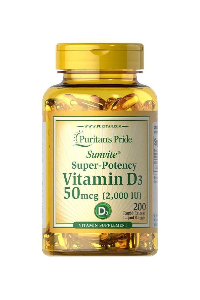 Puritan's Pride Vitamin D3 2000 IU supplement bottle with golden softgels for bone and immune health.