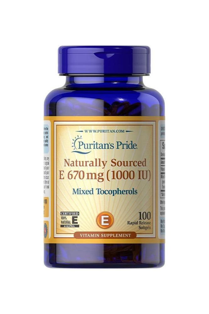 Puritan's Pride Vitamin E 1000 IU supplement bottle with mixed tocopherols, 100 softgels for antioxidant support.