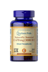 Puritan's Pride Vitamin E 1000 IU supplement bottle with mixed tocopherols, 100 softgels for antioxidant support.