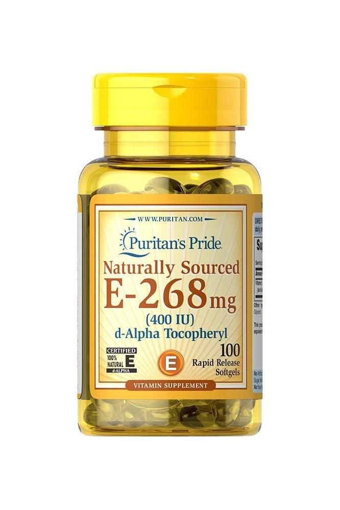 Puritan's Pride Vitamin E 400 IU supplements in yellow bottle with 100 softgels for antioxidant support.
