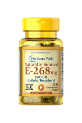 Puritan's Pride Vitamin E 400 IU supplements in yellow bottle with 100 softgels for antioxidant support.