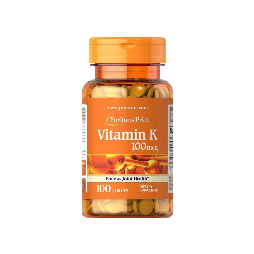 Puritan's Pride Vitamin K 100 mcg dietary supplement bottle with 100 tablets for bone and joint health. Puritan's Pride Vitamin K 100 mcg dietary supplement bottle with 100 tablets for bone and joint health.