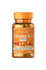 Puritan's Pride Vitamin K-2 MenaQ7 50 mcg softgels for bone health, easy to swallow, promotes strong bones.