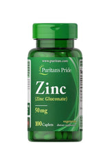 Puritan's Pride Zinc 50 mg dietary supplement bottle with 100 caplets for immune support and enzymatic function.