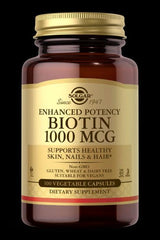 Solgar Biotin 1000 MCG dietary supplement for healthy skin, hair, and nails in a 100 vegetable capsule bottle.