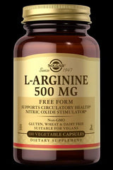Solgar L-Arginine 500 mg dietary supplement in a brown bottle with 100 vegetable capsules for heart health.