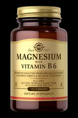 Solgar Magnesium with Vitamin B6 dietary supplement in a glass bottle, 100 tablets, supports nerve and muscle function.