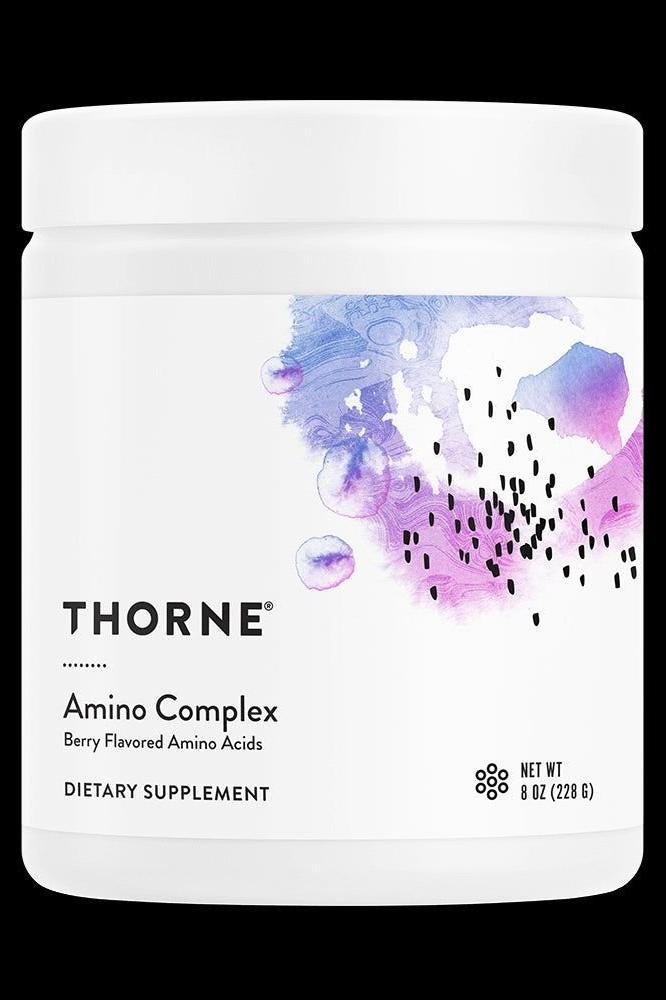 Thorne Amino Complex Berry flavored dietary supplement in a 228g container. Thorne Amino Complex Berry flavored dietary supplement in a 228g container.