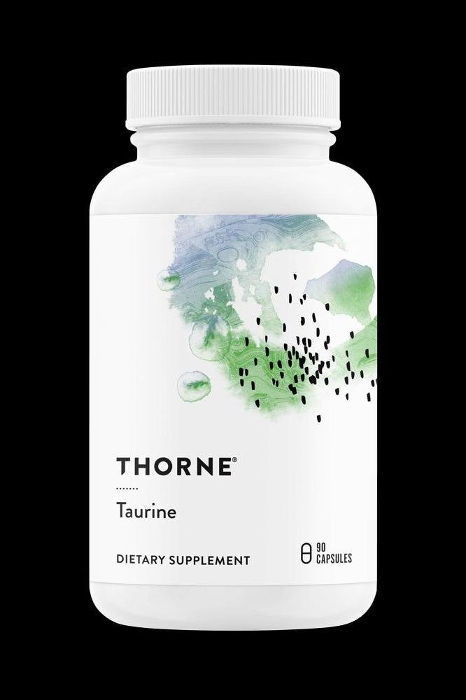 Thorne Taurine dietary supplement bottle with 90 capsules, promoting heart health and liver support. Thorne Taurine dietary supplement bottle with 90 capsules, promoting heart health and liver support.