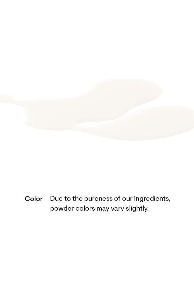 Two spoonfuls of white powder highlighting natural ingredient color variation. Two spoonfuls of white powder highlighting natural ingredient color variation.