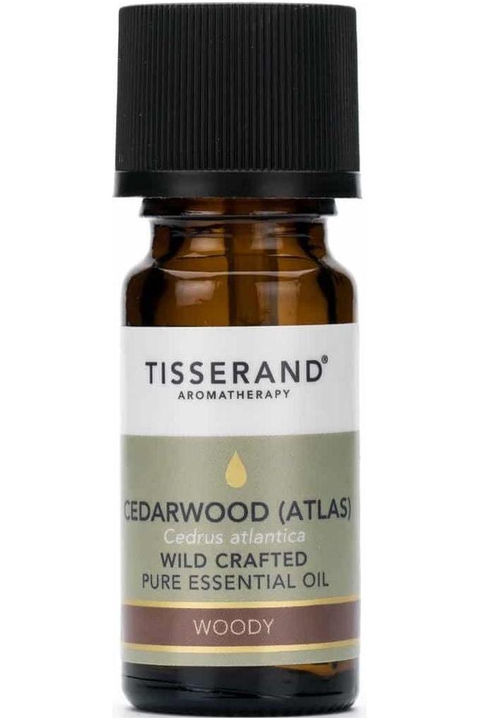 Tisserand Aromatherapy Cedarwood Atlas essential oil bottle, 9 ml, known for its woody aroma and therapeutic benefits.