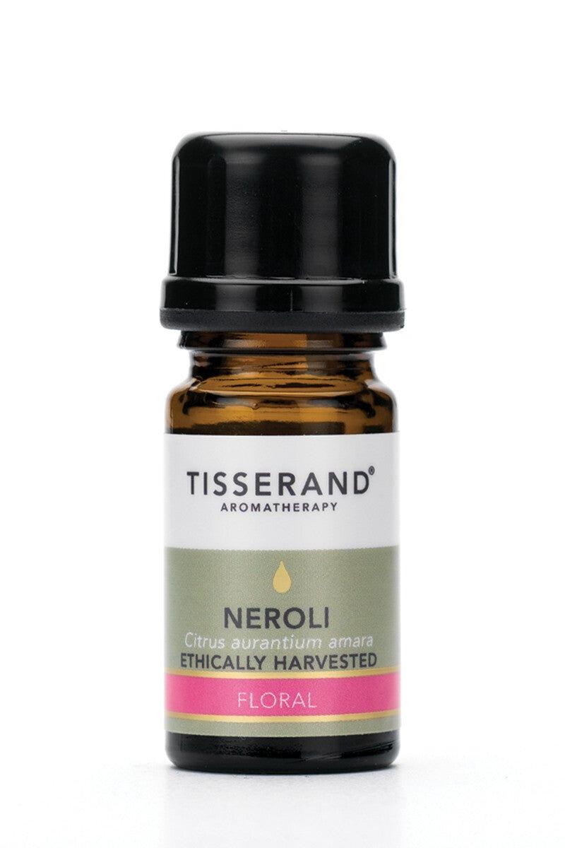 Tisserand Aromatherapy Neroli essential oil bottle, 2 ml, ethically harvested, floral scent for skin hydration and relaxation.