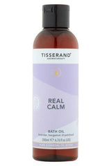 Tisserand Real Calm Bath Oil with lavender, bergamot, and patchouli for relaxation, 200ml bottle.