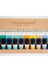 Tisserand Aromatherapy essential oils display case featuring 10 natural oils in elegant wooden holder.
