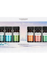 Tisserand Frosty Woodland essential oils set featuring 6 aromatic blends in festive packaging, perfect for gifts.
