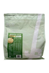 Trained by JP SuperFood Greens vanilla shake packaging featuring nutrition facts and benefits.