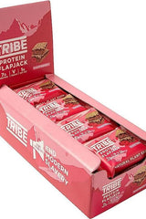 TRIBE Protein Flapjack box displaying raspberry-flavored energy bars with 7g plant protein and vegan ingredients.
