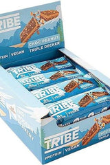 Tribe Choc Peanut Triple Decker protein bars in a display box, vegan, high protein, low sugar snack.
