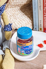 Wellkid Peppa Pig Multi-vitamins gummies on a plate, perfect for kids aged 3-7, featuring a delightful strawberry flavor.