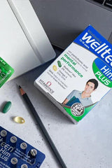 Vitabiotics Wellteen Him Plus tablets box promoting mental performance, alongside green capsules and a pencil.