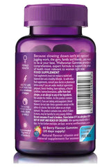 Vitabiotics Wellwoman Gummies bottle with berry flavor, 60 gummies for women's health support.