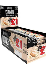 Warrior Crunch Mini Protein Bars display box with high protein and low sugar, featuring white chocolate flavor.