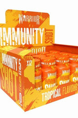 Warrior Immunity Shot display pack featuring 12 vitamin-rich shots in tropical flavor, supports immune health.