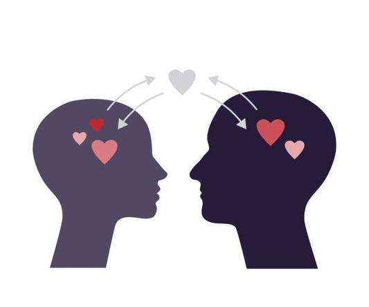Illustration of two heads exchanging hearts, symbolizing emotional connection and the effects of oxytocin.