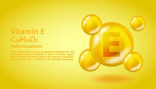 Illustration of Vitamin E molecule, highlighting alpha tocopherol with yellow bubbles.