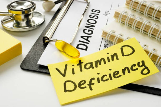 Medical diagnosis concept with a note saying 'Vitamin D Deficiency' and a stethoscope.
