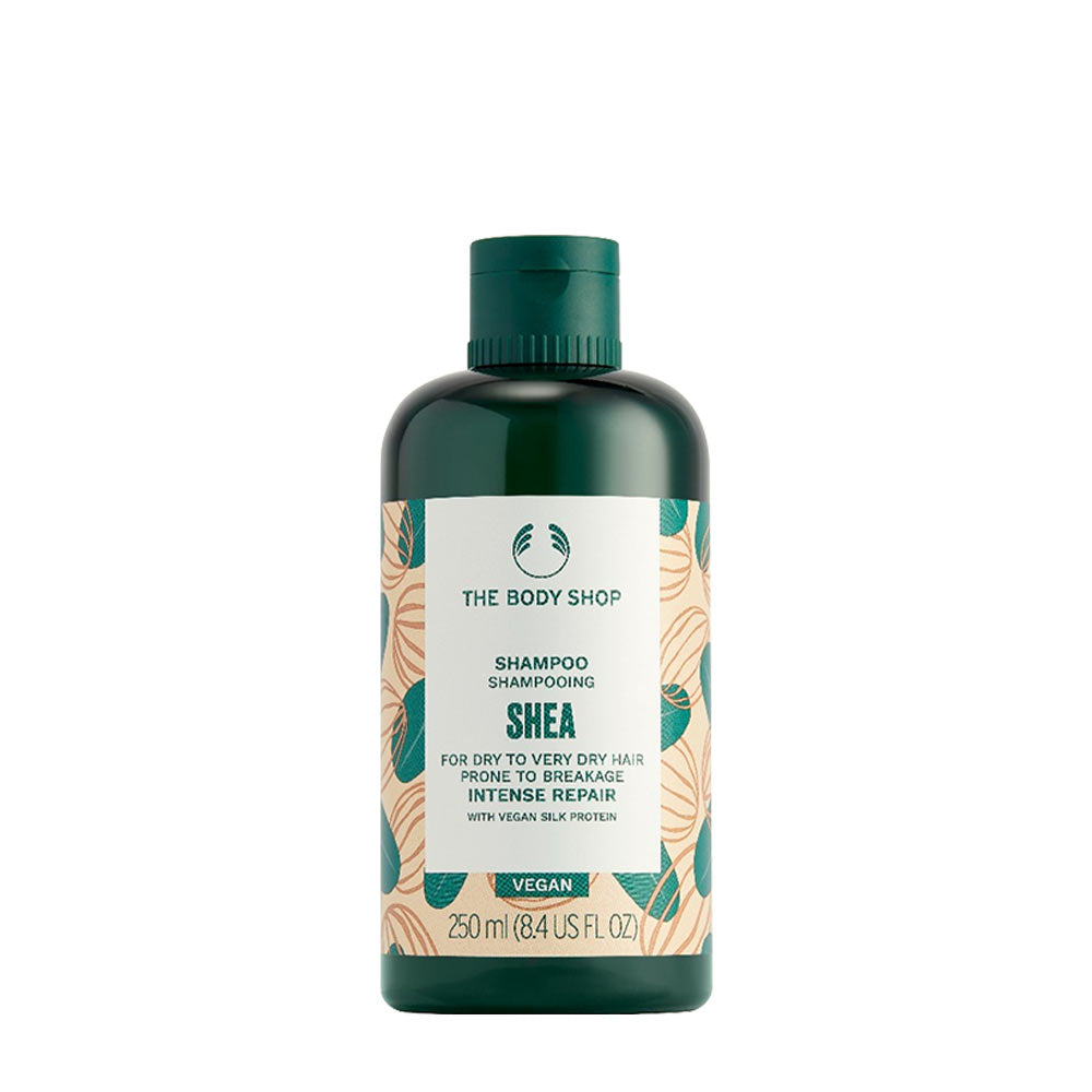 The Body Shop Shea Intense Repair Shampoo bottle for dry, brittle hair, 250ml, vegan formula with natural ingredients.
