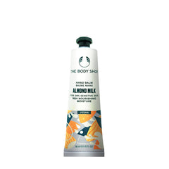 The Body Shop Almond Milk Hand Balm tube for dry, sensitive skin, offering nourishment and hydration.