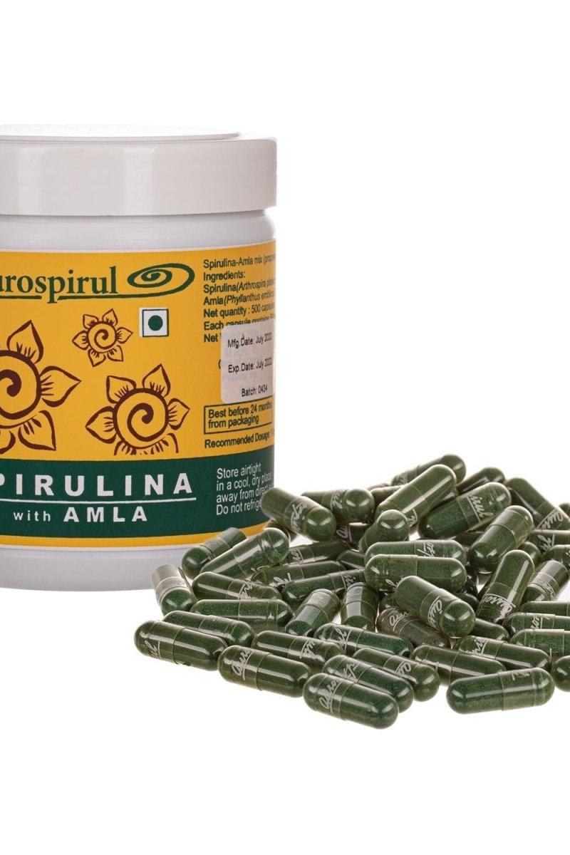 Aurospirul Spirulina with Amla capsules in a container, rich in vitamins and minerals, supports immunity and energy.
