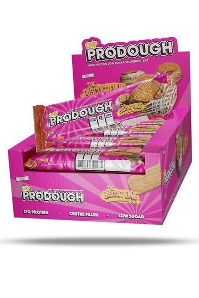 CNP ProDough protein bars display box featuring low sugar, high protein, and doughnut-inspired flavors.