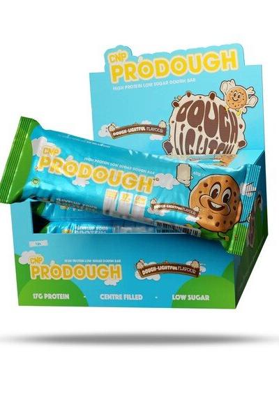 CNP ProDough protein bars display box with doughnut-inspired design, featuring nutritional benefits and low sugar.